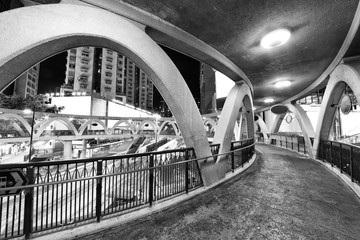 Poster - Empty pedestrian walkway in downtown of Hong Kong city at night