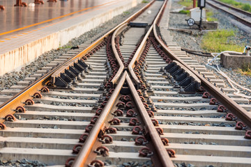 Chiang Mai , Thailand - January, 18, 2020 : Railroad tracks in chiang mai thailand.Crossing railway track railway point on tracks soft lens landscape background.