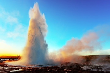 Wall Mural - Gorgeous Geysir geyser erupting in southwestern Iceland, Europe.