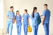 © Pixel-Shot - Group of medical students in hall of clinic