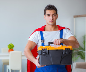 Super hero repairman working at home