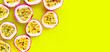Passion fruit on yellow background.