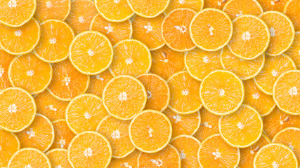 Wall Mural - Organic orange fruit slices natural juicy background.