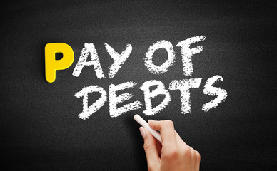 Pay of debts text on blackboard, business concept background