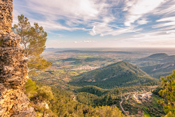 View of the mountains of Alaró and its castle at sunset. Mallorca Island Balearic Islands Spain