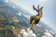 © vladimirzhoga - Skydiving tandem in a free fall