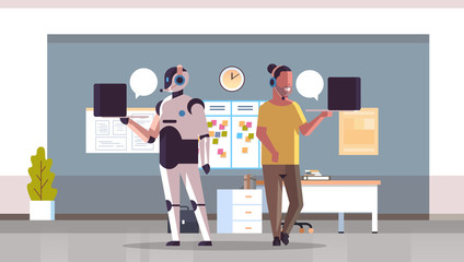 Poster - robotic operator with man consultant using laptop chat bubble client support robot vs human standing together call center office interior artificial intelligence concept full length horizontal vector