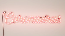 Bright Pink Neon Sign That Says The Word Coronavirus On A White Wall Background
