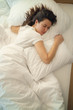 © Space_Cat - Young beautiful alone woman sleeping on bed in bedroom