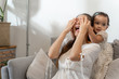 © ronnachaipark - Happy loving family. Mother and her daughter child girl playing and hugging with happiness