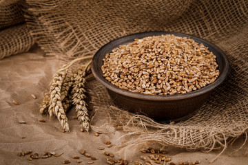 Wall Mural - grains and ears of wheat on Kraft paper and burlap