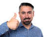© Aylin - Happy mature man gesturing thumbs up, white background.