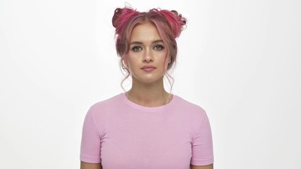 Sticker - An exhausted young woman with the colored pink hairstyle is doing kill gesture isolated over white background