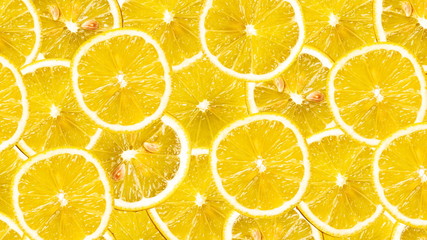 Wall Mural - Organic lemon fruit slices natural juicy background.