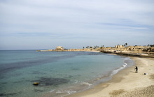 Caesara, Israel - View On Fisherman In Bay, And Port In Distance