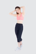 © NT_studio - Beautiful portrait young asian woman standing workout stretch muscle arm with healthy isolated on white background, asia girl wear sport clothes exercise and yoga for health, wellness concept.