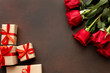 Valentines day assortment with roses and wrapped gifts