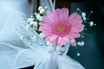 Beautiful pink Gerbera daisies for decoration on the table for wedding party ceremony.