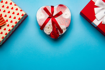 Red gift boxes on a blue background, Flat lay,top view