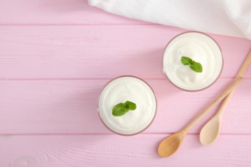 Wall Mural - Natural white yogurt on the table. Healthy snack, Greek yogurt.