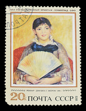 CIRCA 1973: The Stamp Depicts The Painting “Girl With A Fan” By Renoir, State Hermitage Museum, Leningrad.