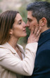 © Quique - Young couple kissing with complicity