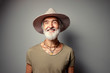 © luengo_ua - Middle aged traveler. Studio portrait of handsome senior man with gray beard and hat.
