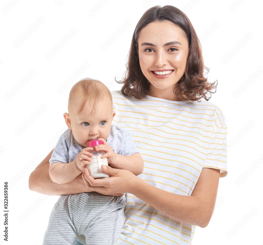 Mother feeding baby with milk from bottle on white background