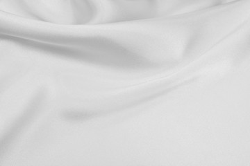 Wall Mural - Delicate satin draped fabric white texture for festive backgrounds