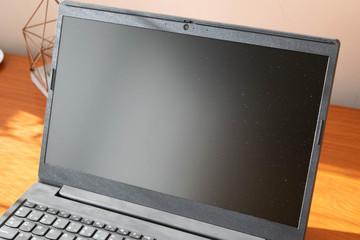 Grey laptop on office desk