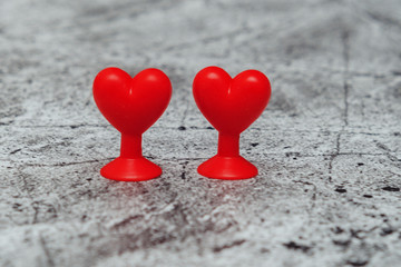 two toy hearts on a suction cup. Valentine's Day.