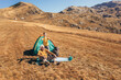 © Mediteraneo - Boy camping with grandfather in autumn.