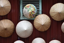 Vietnamese Nón Lá Conical Hats Hanging On Wall, Hanoi 
