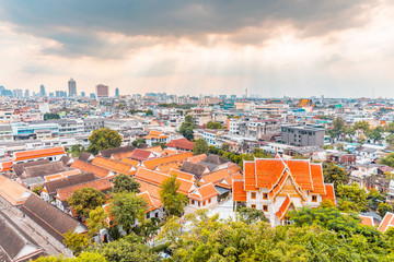 Wall Mural - Panoramic view of Bangkok, Thailand, with a temple on foreground