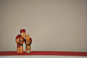 Wall Mural - Japanese Kokeshi dolls of happy old couple