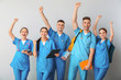 © Pixel-Shot - Group of happy medical students on light background