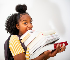 Wall Mural - black teenage girl student holding many books by white background