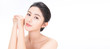 Closeup portrait of beauty asian woman fair perfect healthy glow skin hand touch shoulder copy space, young beautiful asia girl with pretty smile on face. Beauty korean clinic skincare concept banner