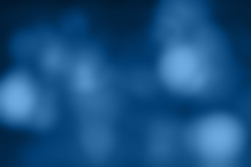 Wall Mural - Different shades of classic blue blurry lights. Dark blurred background in trend colors