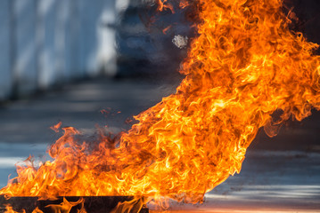 The background of the hot fire was lit up to illustrate the heat of the flame and was used for initial firefighting for residents of a condo or city. Introduction to fire and firefighting.