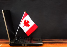 Flag Of Canada , Computer, Laptop On Table And Dark Background