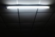 White old fluorescent lamp on ceiling