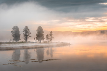 Morning fog at the Yellowstone Lake. Yellowstone National Park, Wyoming USA