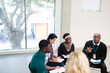 © Sam Edwards/Caia Image - People talking in support group meeting circle