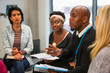 © Chris Ryan/Caia Image - Business people talking in meeting