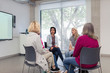 © Sam Edwards/Caia Image - Womens support group meeting in circle
