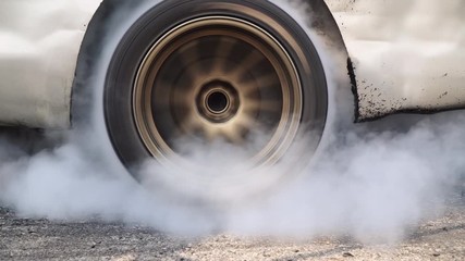 Wall Mural - Drag racing car burn tire in preparation for the race