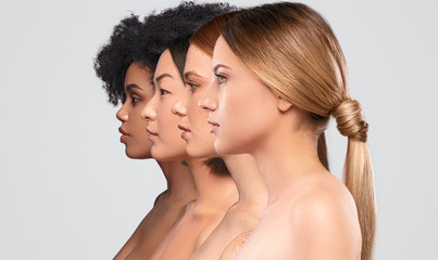 beautiful multiethnic women standing in row