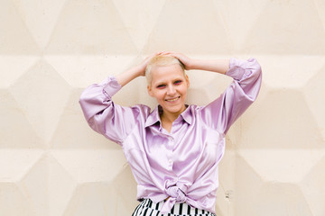 Wall Mural - Young woman with very short hair