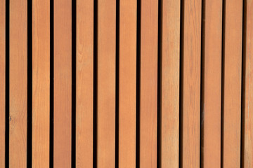 Sticker - Vertical natural wooden slats on the wall.